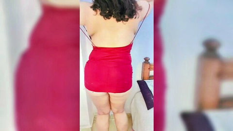 Curvy Egyptian woman in red backless mini dress showing big ass