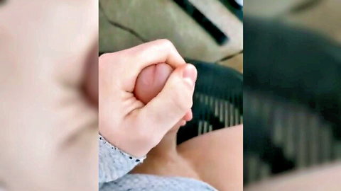 Man's hand gripping and squeezing woman's bare pink toes closeup foot fetish