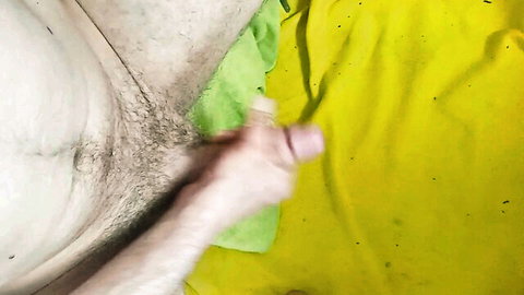 Hairy skinny guy strokes his hard erect cock in closeup amateur solo handjob