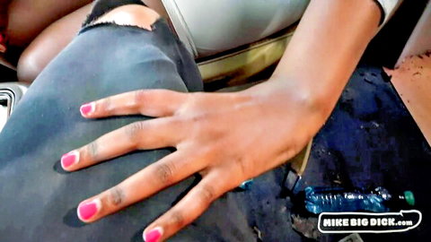 Ebony babe with pink nails strokes massive black monster cock in car POV