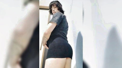 Trans babe bending over in tiny black skirt exposing bare juicy ass cheeks in mirror