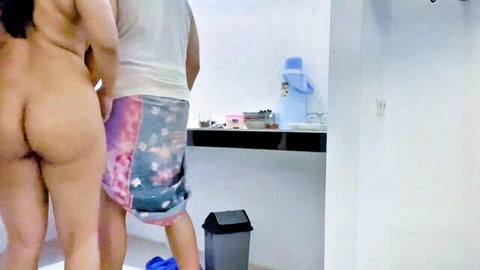 Naughty Tamil cougar bent over nude, juicy ass exposed with man behind