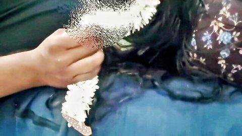 Desi Tamil Bhabhi hand holding jasmine garland in hot Indian video