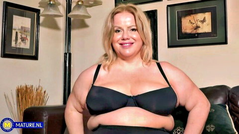 Fat mature blonde BBW with big tits in black lingerie