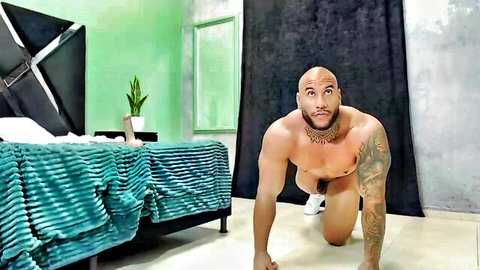 Andrewjohnson0 muscular bald Black man on all fours nude masturbating