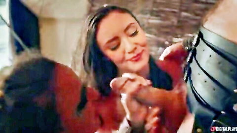 Amirah Adara smiling while handling cock in Viking helmet scene