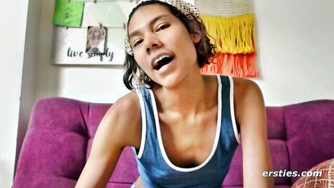 Caroline in blue tank top, teasing nipples in steamy solo play