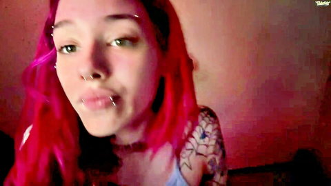 Lookingforlona redhead with piercings and tattoos teases in blue top on Chaturbate