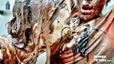 Messy foot anal fisting with wet woman in orange top covered in fluids