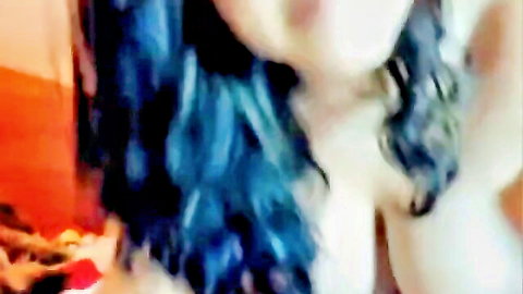 Big-titted brunette exposing huge boobs in steamy webcam show