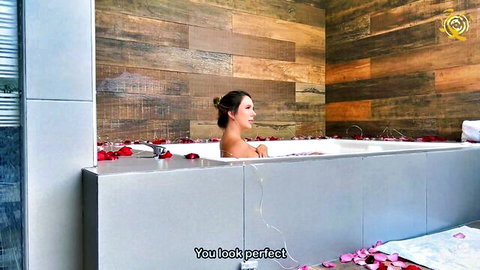 Scarlet Benz nude in luxurious rose petal bathtub, relaxing POV
