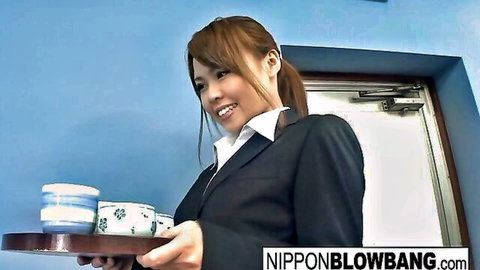 Smiling Japanese office lady in suit serving drinks, blowbang teaser
