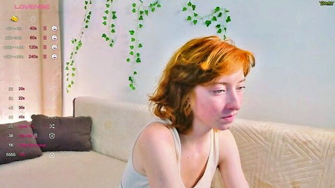 Redhead camgirl luvenianitschke in white tank top on Chaturbate, teasing solo show