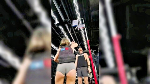 Fit blonde in tight gym shorts dominated by trainer in private session