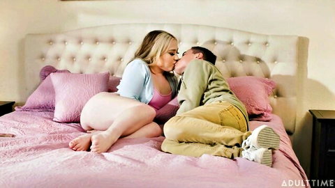 Eva Nyx kissing Juan Loco passionately on bed