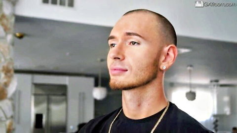 Shaved-head man in black tee during unforgettable trans massage