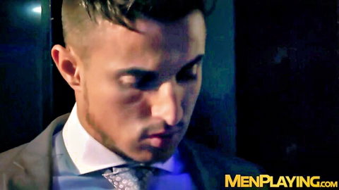 Dato Foland in suit, intense executive gaze from gay threesome video