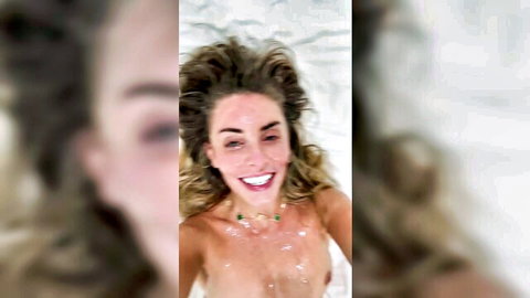 Bonnie Blue smiling cum-covered after 1000 men gangbang selfie