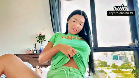Sexy Asian step sister lifts green shirt in POV amateur tease
