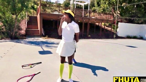 Ebony MILF Ana Foxxx in sexy white tennis skirt and yellow socks on court