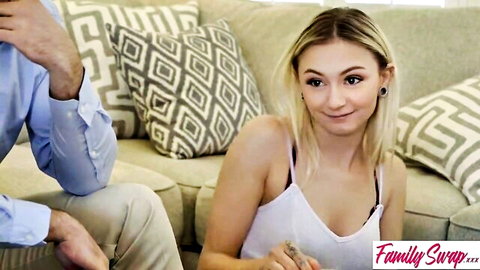 Blonde Chloe Temple in white tank top with Nathan Bronson on couch - Family Swap