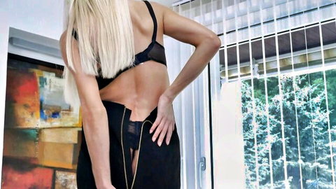Lena Love sexy blonde in black lingerie, unzipping from behind