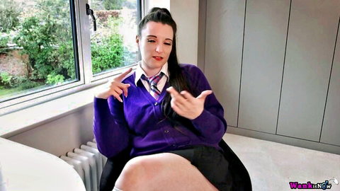 Schoolgirl in purple sweater and plaid skirt gives JOI with pointing fingers