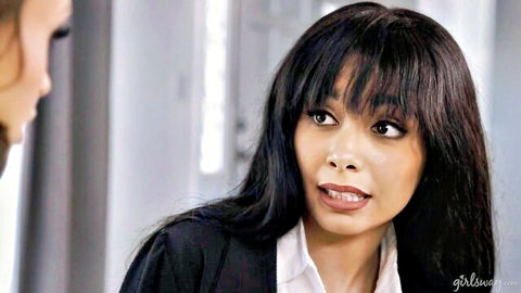 Aaliyah Hadid in office blazer, surprised expression with another woman