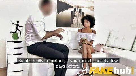 Ebony babe in off-shoulder top and mini skirt chats with agent on casting couch