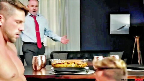 Suited daddy and muscular shirtless boy at taboo dinner scene