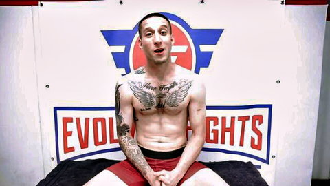 Cody Carter muscular tattooed fighter in red underwear, EvolvedFights vs Nina Nova fetish