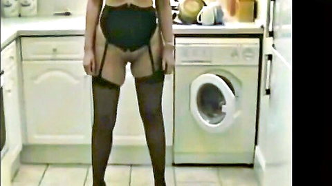 Vintage 1991 solo woman in black garter belt and stockings, exposed crotch, Guernsey style