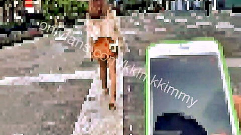 Blonde in mini skirt walks street, public remote toy tease vibe