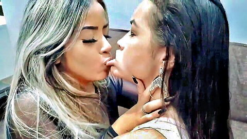 Brazilian lesbians in passionate tongue kissing and face squishing embrace