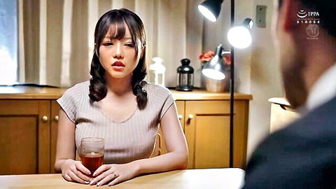 Rich A in off-shoulder top, intense gaze holding tea in JAV tease