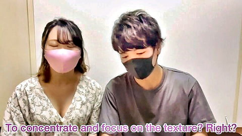 Masked Japanese amateur couple Emu Yumi in close meditation pose, casual clothes