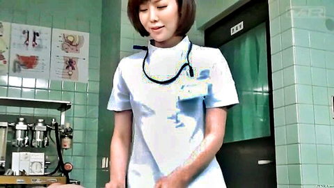 Japanese female doctor in white uniform smiling in clinic for CFNM handjob scene