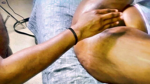 Obese black woman's exposed vagina being spread by hand close-up
