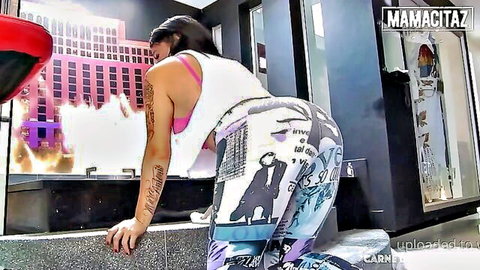 Tattooed Latina with bubble butt bends over exposing shaved pussy and ass in tight leggings down