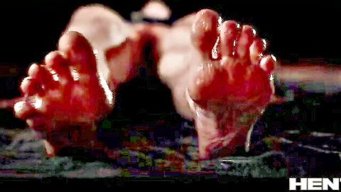 Lottie Magne's bare wet feet in red-lit alien impregnation scene