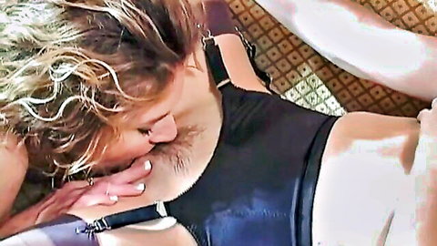 Big-breasted blondes Anna and Seska in black harness intimate kiss