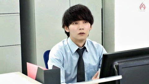 Surprised Japanese office worker in suit at desk JAV thumbnail