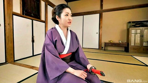 Naomi Togo in purple kimono holding red sword, Asian JAV beauty