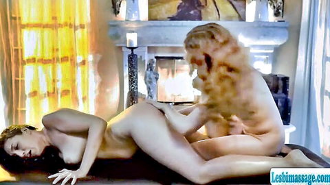 Two nude babes in oiled lesbian massage, passionately licking pussies