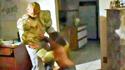 Topless brunette woman bent over for doggy style sex with older man