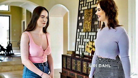 Busty brunettes Siri Dahl and teen in low-cut pink top show huge tits cleavage smiling seductively