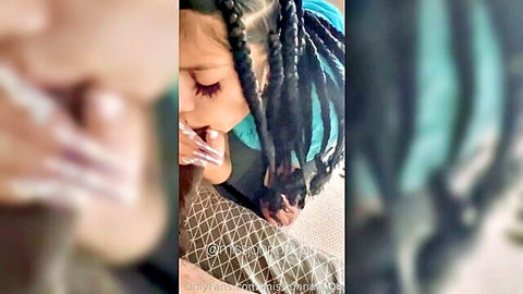 Ebony girl with braids sucking dildo in close-up OnlyFans tease