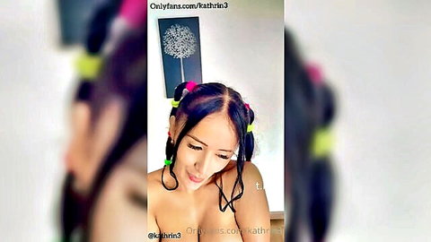 Kathrin3 seductive topless pose with pigtails in anal candy sex