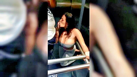 Brunette with big tits giving blowjob to guy in public bus holding bars