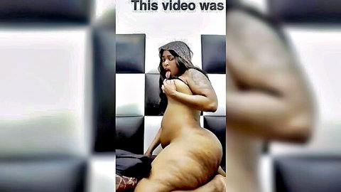 Ebony pregnant BBW with huge ass and curves posing nude solo